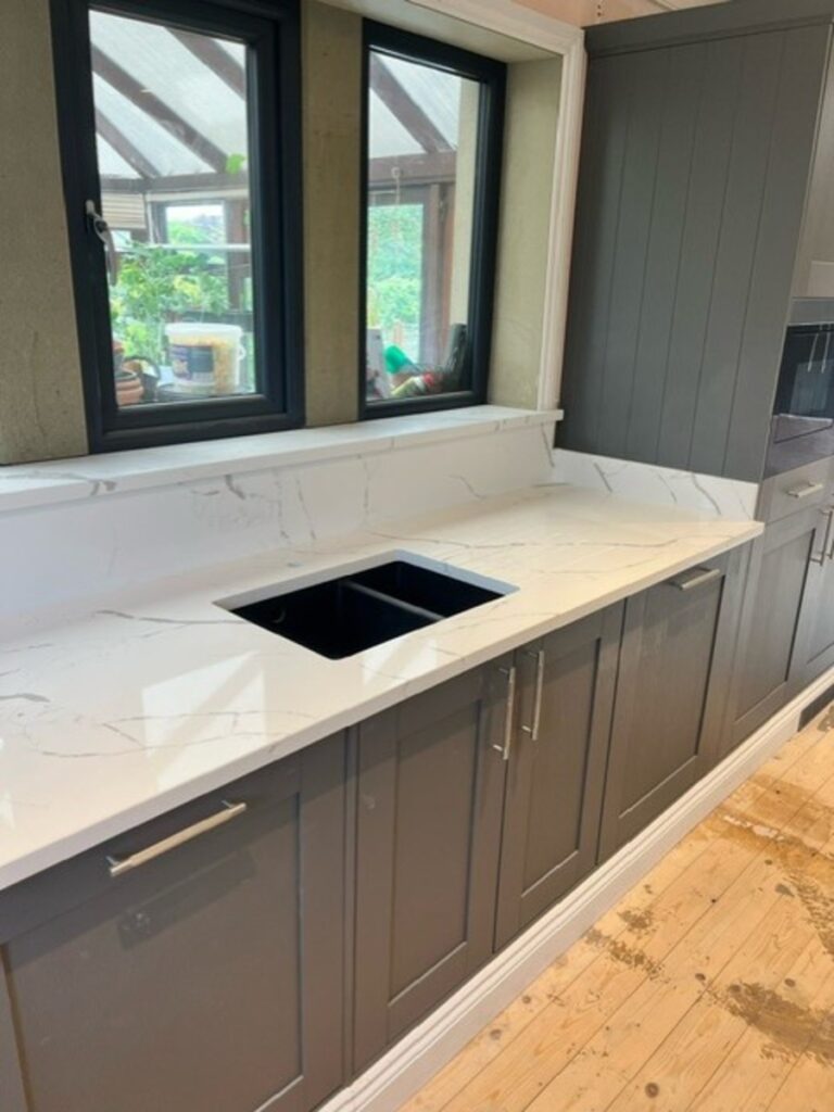 Cimstone Calacatta Venato worktop with a black undermount sink installed in Skipton