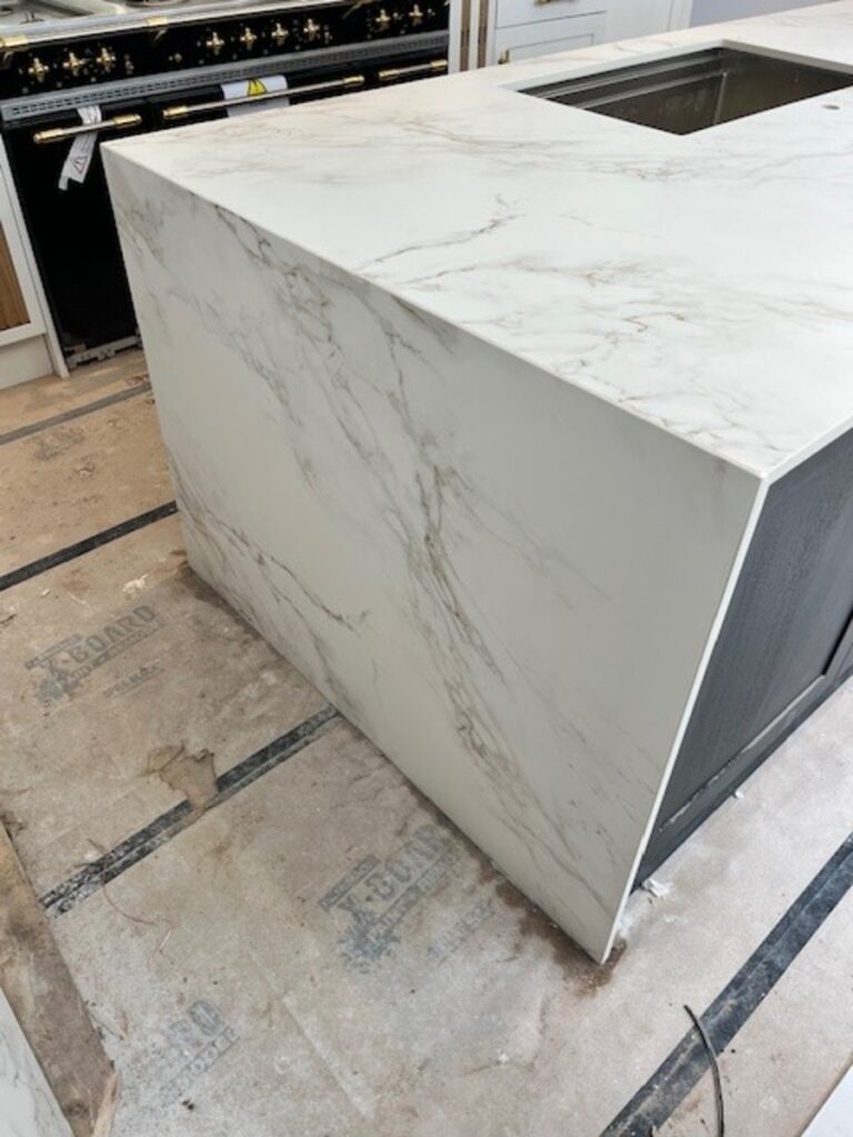 Dekton Entzo Island with a waterfall edge profile installed in Lancashire Bury