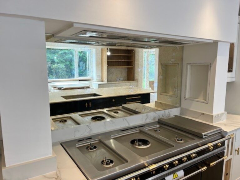 Dekton Entzo worktops with Antique Mirror Glass splash back installed in Bury Lancashire