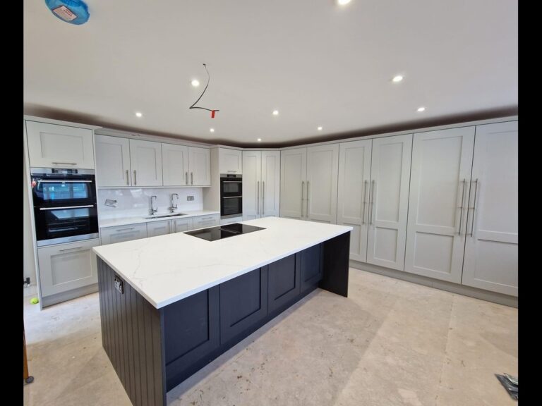 Fugen Avalanche Island white with a thing grey vein running through it installed in Atherton Manchester