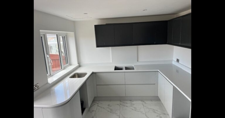 White Shimmer Supreme worktops installed in Westhoughton Bolton with a matching upstand, window sill and hob splash back