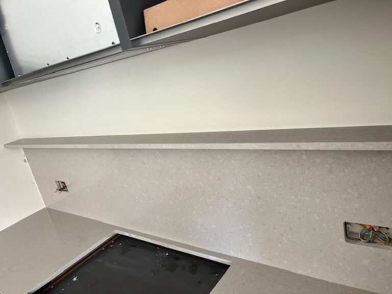 Silkstone Oakham Ash with a floating shelf installed in WIlmslow Cheshire